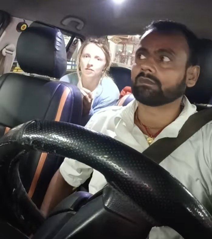 CountryGulshan's tweet photo. Late at night, a Russian woman landed in India and took a cab from the airport. As she got in, the driver looked at her and politely asked, "Madam, do you know English? Please show me the OTP."

She knew only a little English, so she showed him the OTP.

The driver then asked, "Is this your first time in India? Are you travelling alone?"

She smiled, nodded, and said, "I'm hungry. Is any pizza shop still open?"

A few minutes later, the driver stopped near a hotel, went inside for two minutes, and came back. The woman started feeling a little nervous. Since it was her first visit to India, she sent the cab details to her husband, just to be safe.

Soon, the driver returned with a fresh pizza, handed it to her, and continued the journey. When they reached her hotel, he helped her with the directions to the entrance.

Relieved and touched by his kindness, the woman smiled, paid the fare, the cost of the pizza, and even offered him an extra ₹1,000 as a tip.

The driver politely returned the extra money, folded his hands, and said, "Atithi Devo Bhava"—which means "The guest is like God."

The woman was deeply moved. After checking into her room, she went live on social media and shared the entire experience. She praised the driver's honesty and kindness and said, "Next time, I'll definitely come back to India with my husband."