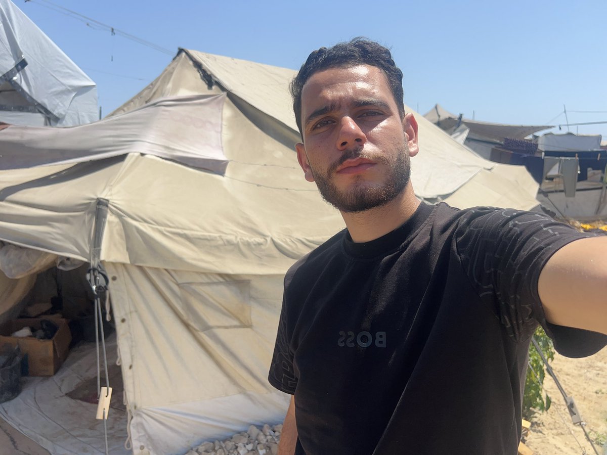 MohammedShabat8's tweet photo. The tent is a part of hell. The heat in it is unbearable. How long will we continue to live in tents? Is this our fate? The heat in the tent kills children. What happens to us is forbidden.

https://t.co/M7ymOx06f3 https://t.co/1MrHG3yrXK
