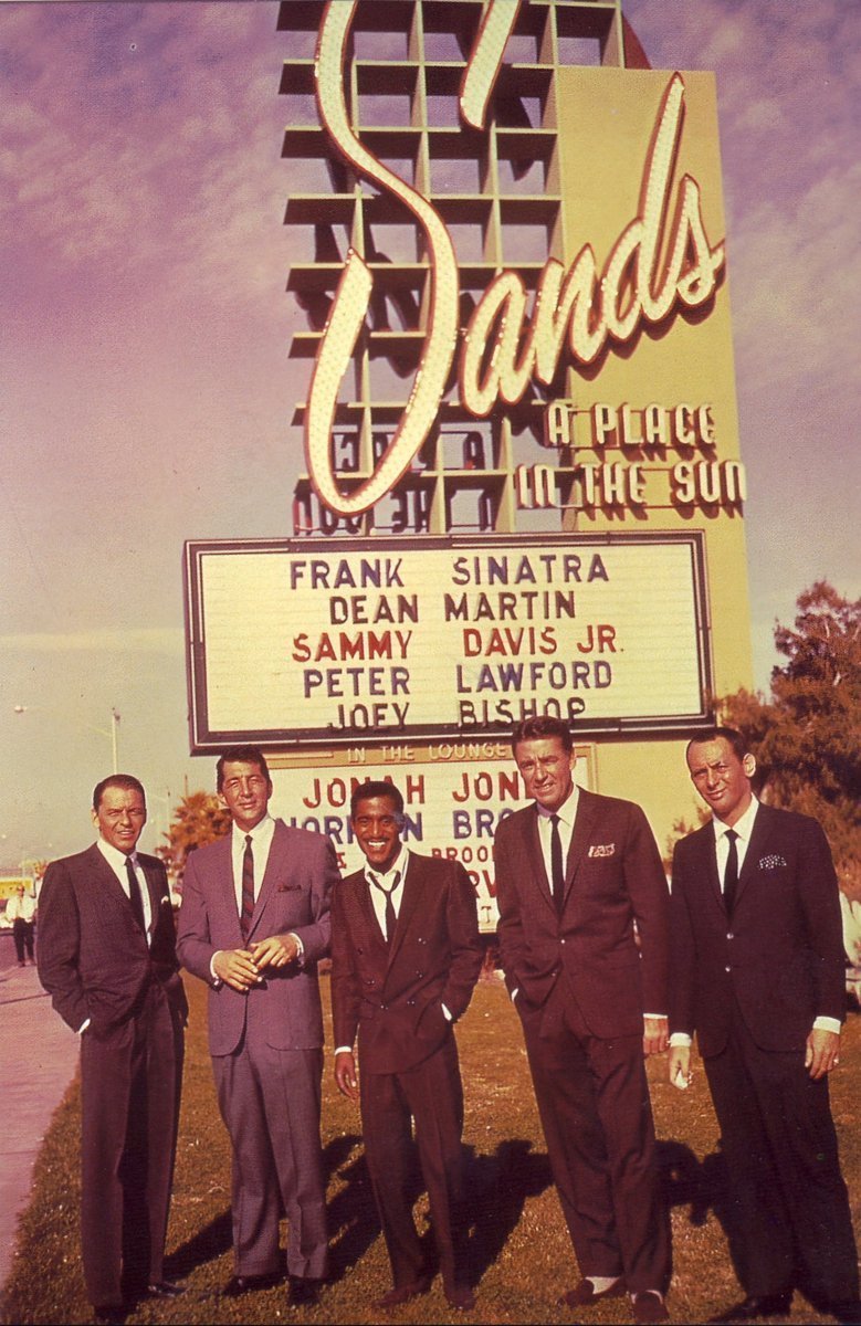 _GrandPaD's tweet photo. Some Oceans 11 trivia - 1st pic is a "wardrobe shot" of SDJr. after shooting the final scene. A camera man asked for a group shot under the Sands #LasVegas marquee.  No still camera had color film, so they used a movie camera and picked a usable frame for this iconic picture. https://t.co/zxRl1c0125