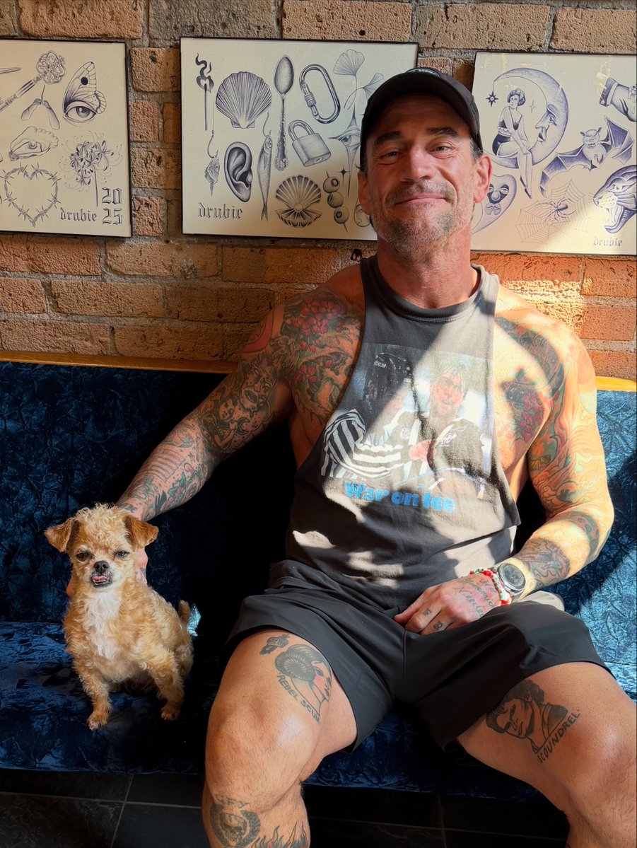 Teffo_01's tweet photo. CM Punk just got a new tattoo of Larry with Spud the Cryptid ❤️😭 https://t.co/8Y6nZjd1oB