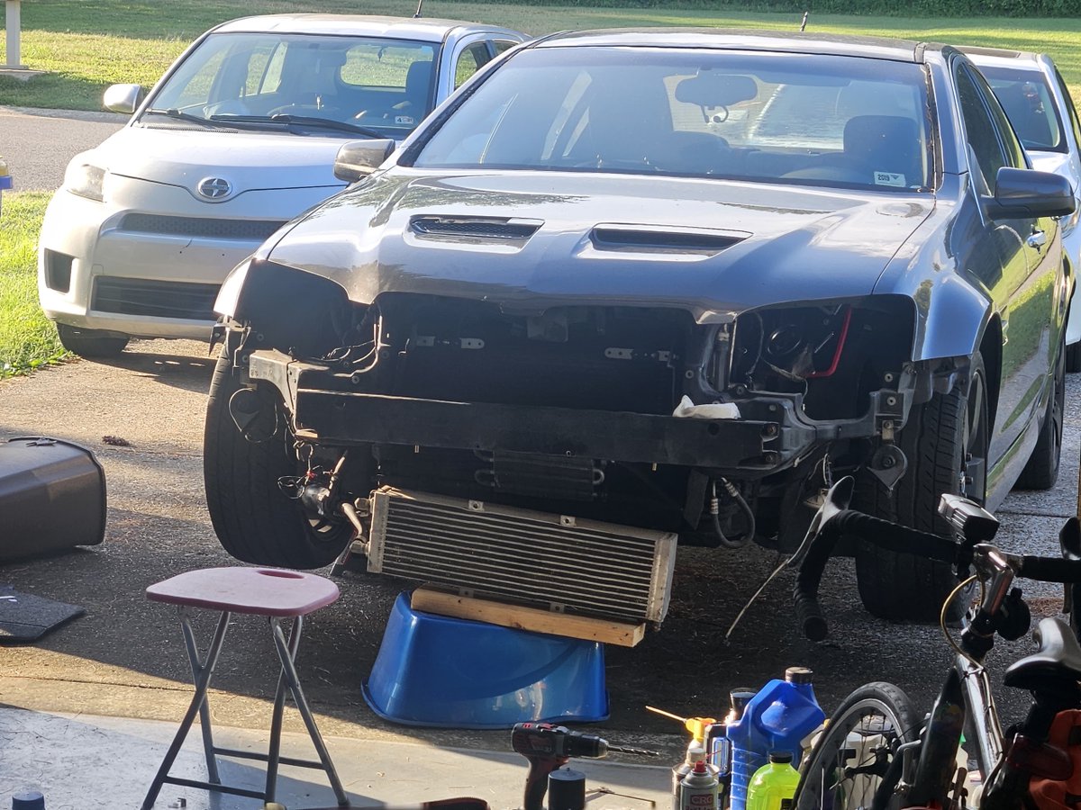CowsGoMooooouwu's tweet photo. New transcooler and ps cooler installed properly :D Ghetto driveway setup...I STILL LOOK CUTE DIRTY AFTER 97 DEGREES OF WORKIN. https://t.co/OT15UQdFAK