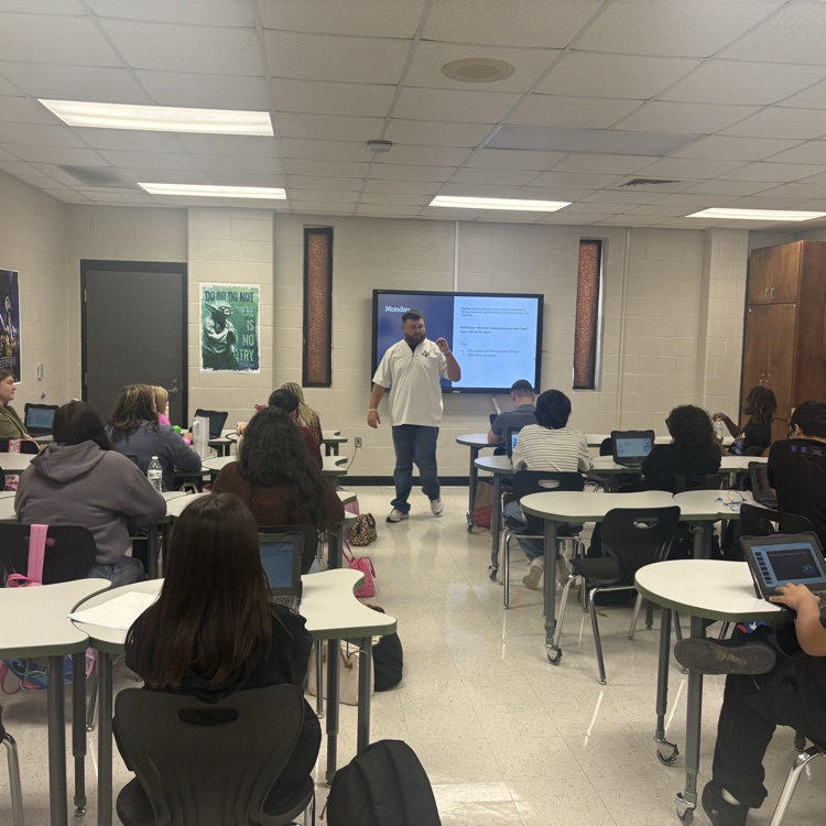 palmer_hs's tweet photo. Coach Byers getting class started this afternoon, Mrs. Lopez's Spanish class working on interactive notebooks, and Mr. V's theatre class working on their lines and building connections today. Week 2 is underway at PHS! #DareToBeBetter #Bettereverydayineveryway https://t.co/px2mTdO4nJ