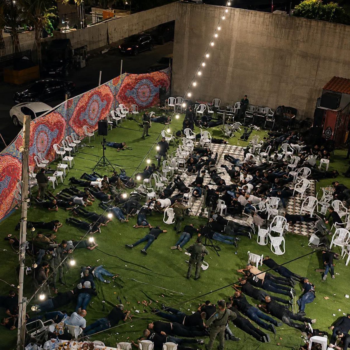 QudsNen's tweet photo. Last night, Israeli occupation forces stormed a Palestinian wedding celebration in Umm al-Fahm, in 1948-occupied Palestine, threw stun grenades among the guests, and ordered everyone to lie on the ground. https://t.co/xphMqnxqnj