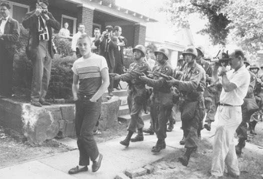 WomanDefiner's tweet photo. This is a photo where a sitting president used the national guard and Army to desegregate schools but they aren't allowed to secure the border... That would be unconstitutional.

They can point guns at American kids, they can force them into social situations they don't want to be in by God help them if they're used to secure the border from foreign invaders.