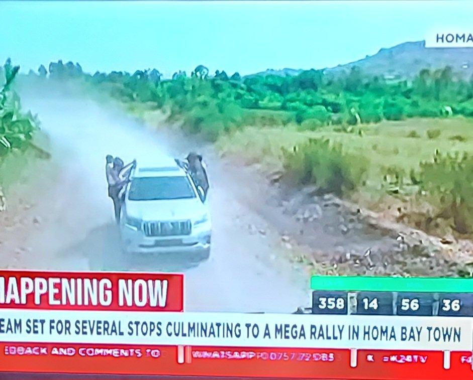 A_Benecha's tweet photo. Buana how much are these guys paid to hang on those SUVs moving at such an ungodly speed on rough roads? Its seems Homabay has only 2Kms road tarmaced. Linda mwananchi has exposed that county leadership badly https://t.co/wTKooIkcZ8