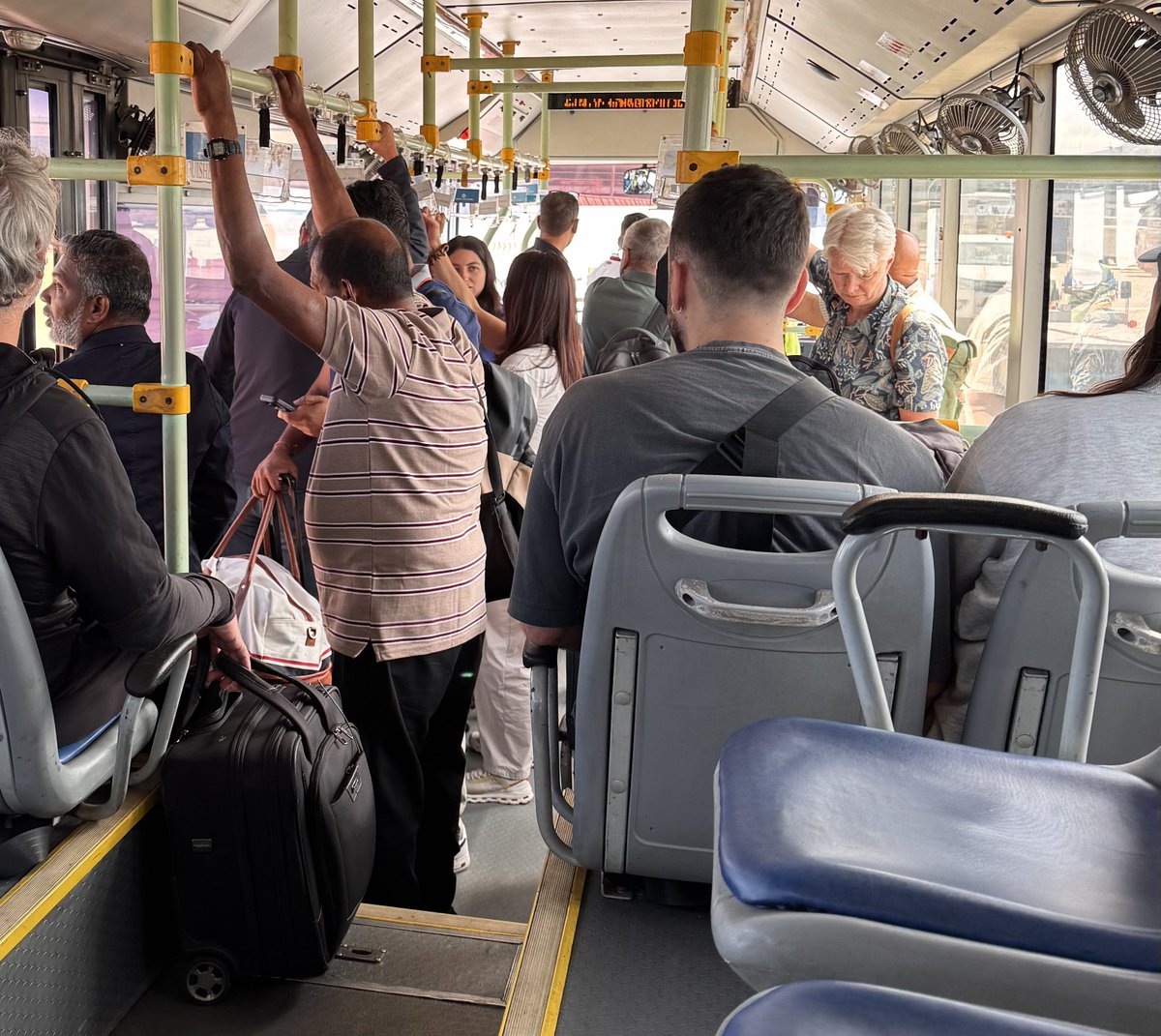 gita_mathew's tweet photo. Passengers stepping off a Business Class flight only to be herded into a tired Ashok Leyland shuttle with worn seats, scuffed floors is not the welcome high-value travellers expect Sri Lanka. 
Most of the foreigners seemed laughingly shocked & I was amused.🙈😒🤦🏻‍♀️
First and last impressions matter disproportionately with this segment. They notice the gap between the product they’re paying for and the product on the ground.
Sri Lanka should do better if the ambition is genuinely high-yield tourism rather than pure volume. A dedicated premium airside transfer (clean, air-conditioned, proper seating ) is a relatively low-cost, high-signal improvement. It simply signals that we understand the difference between a passenger and a high-value traveller to the country. 
@BIA_SriLanka @tourismlk 
We have to do better !