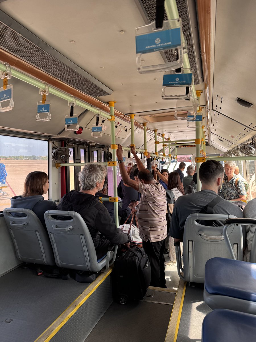 gita_mathew's tweet photo. Passengers stepping off a Business Class flight only to be herded into a tired Ashok Leyland shuttle with worn seats, scuffed floors is not the welcome high-value travellers expect Sri Lanka. 
Most of the foreigners seemed laughingly shocked & I was amused.🙈😒🤦🏻‍♀️
First and last impressions matter disproportionately with this segment. They notice the gap between the product they’re paying for and the product on the ground.
Sri Lanka should do better if the ambition is genuinely high-yield tourism rather than pure volume. A dedicated premium airside transfer (clean, air-conditioned, proper seating ) is a relatively low-cost, high-signal improvement. It simply signals that we understand the difference between a passenger and a high-value traveller to the country. 
@BIA_SriLanka @tourismlk 
We have to do better !