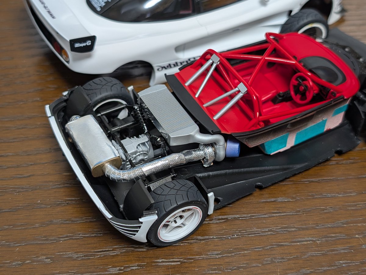 MM_Labs_24's tweet photo. 1/24 RE雨宮 GReddy 6 '00 White Color完成🎉
言わずと知れたRE雨宮の魔改造AZ-1。2001年の東京オートサロンに出展された仕様をイメージしました。
実車リスペクトでAZ-1と962Cのプラモデルの部品を使いつつ、メインのボディはデジタルでモデリングして3Dプリントしたものです。
かっこよすぎる…！ https://t.co/bfFtmpp5K5