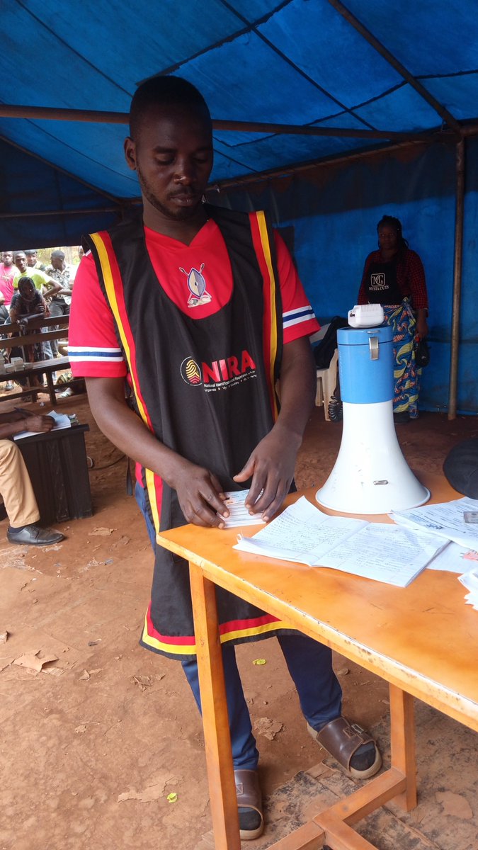 asumanmk's tweet photo. Please help us . This man needs to be disciplined. He is embarrassing people who come to collect IDs using his microphone. For details inbox please 
@NIRA_Ug https://t.co/JDOQCh8NwC