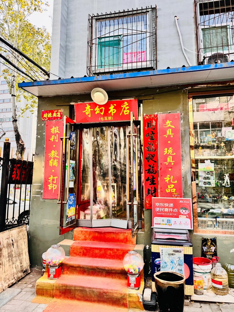 Elisabe09234096's tweet photo. A random street corner catch: old man tuning his bike under a neon sign, passing strangers nodding—small warm bits make the city sing.， https://t.co/kBMB0RdBcx