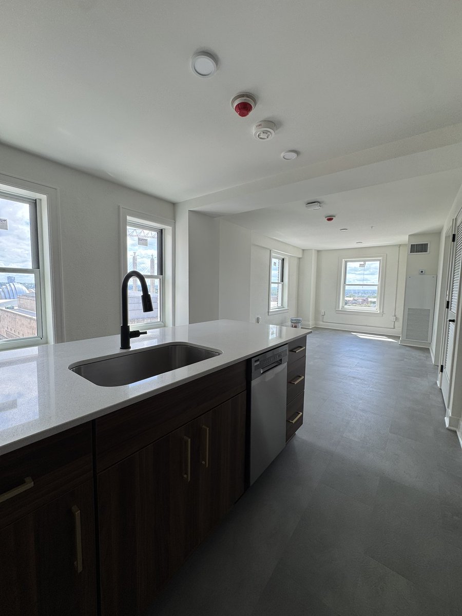 molzer's tweet photo. Believe it or not, this is the same space 12 months apart. 

Tore everything out &amp; started from scratch with just shell back to the concrete floors, columns and ceilings. https://t.co/T6cyb2u3FS