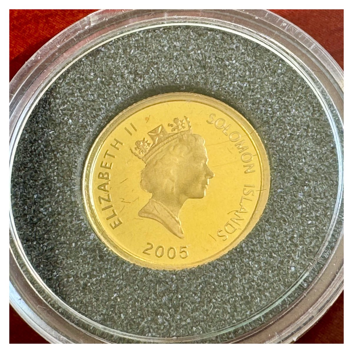 hopeagold's tweet photo. First in my 25 coin series for a full gold ounce: a Solomon Islands 10 Dollars, struck in 2005 for the 25th anniversary of John Lennon's death. 1.24 grams of fine gold, honoring an icon of music and peace, gone from the world at just 40 years old.#FractionalGold #JohnLennon https://t.co/qEkmiUu3ZH
