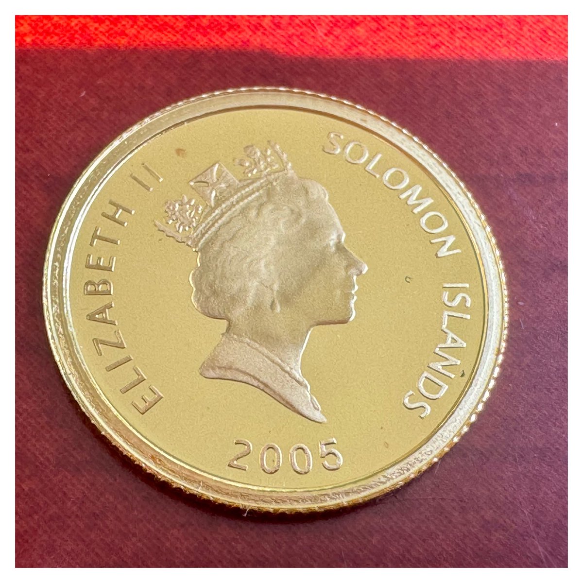 hopeagold's tweet photo. First in my 25 coin series for a full gold ounce: a Solomon Islands 10 Dollars, struck in 2005 for the 25th anniversary of John Lennon's death. 1.24 grams of fine gold, honoring an icon of music and peace, gone from the world at just 40 years old.#FractionalGold #JohnLennon https://t.co/qEkmiUu3ZH