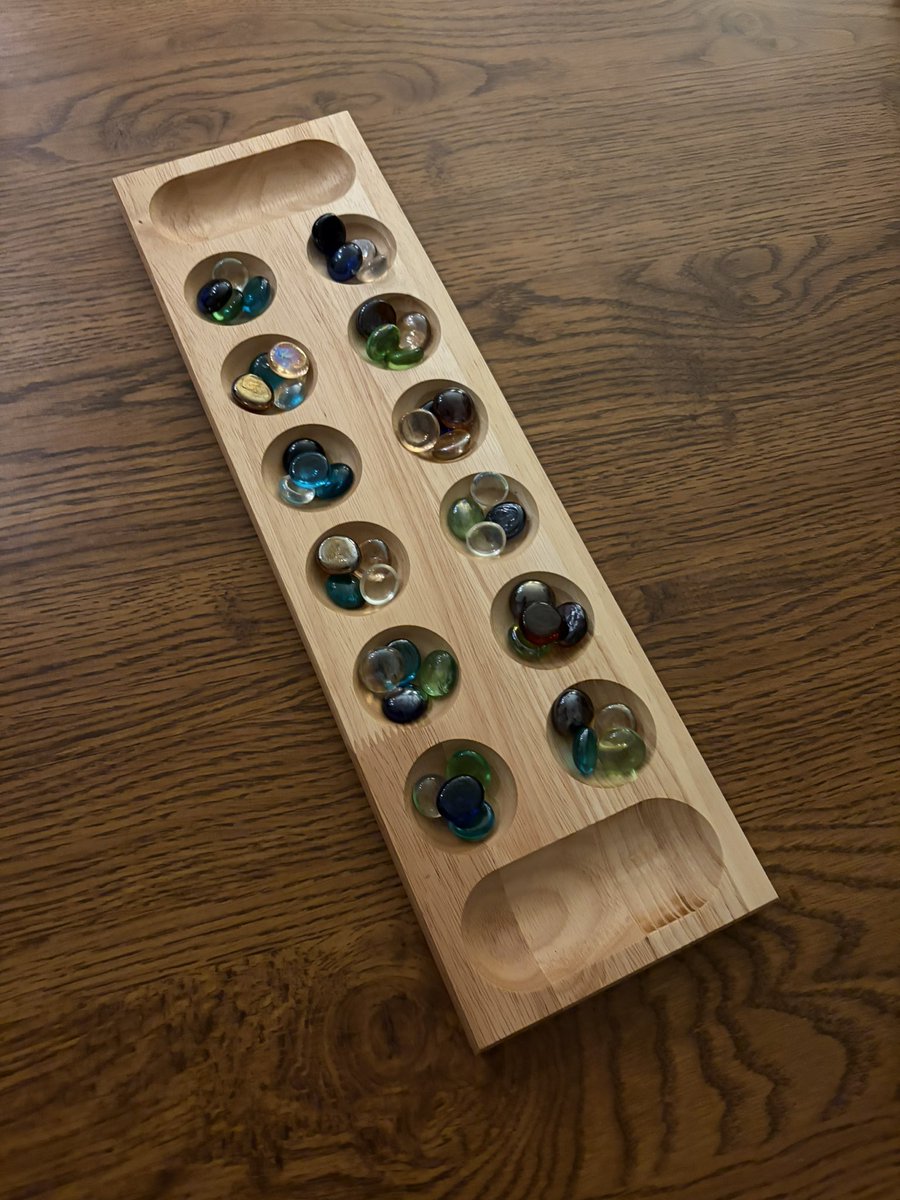 owroot's tweet photo. Remember this game? 

To me it’s one of those games that reminds me of a summer cottage. It’s like that is where it’s most at home. I hadn’t played it in years. The sound of the little pieces is pleasing to the ear and it’s fun to sit around and play on a summer afternoon. https://t.co/bVAjren1Gv
