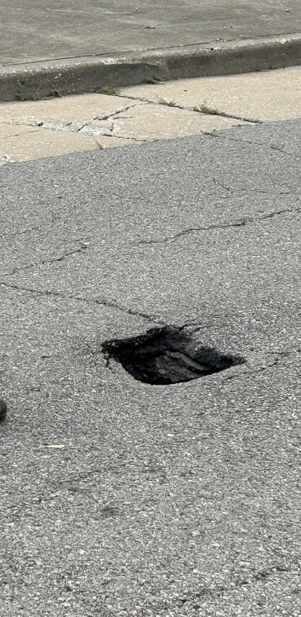 CurlsByCass's tweet photo. @stlcsb there seems to be a sink hole starting at Bent &amp; McDonald Ave and this cone isn’t preventing people from driving over it. Zip code 63118 https://t.co/odewxZI4WS