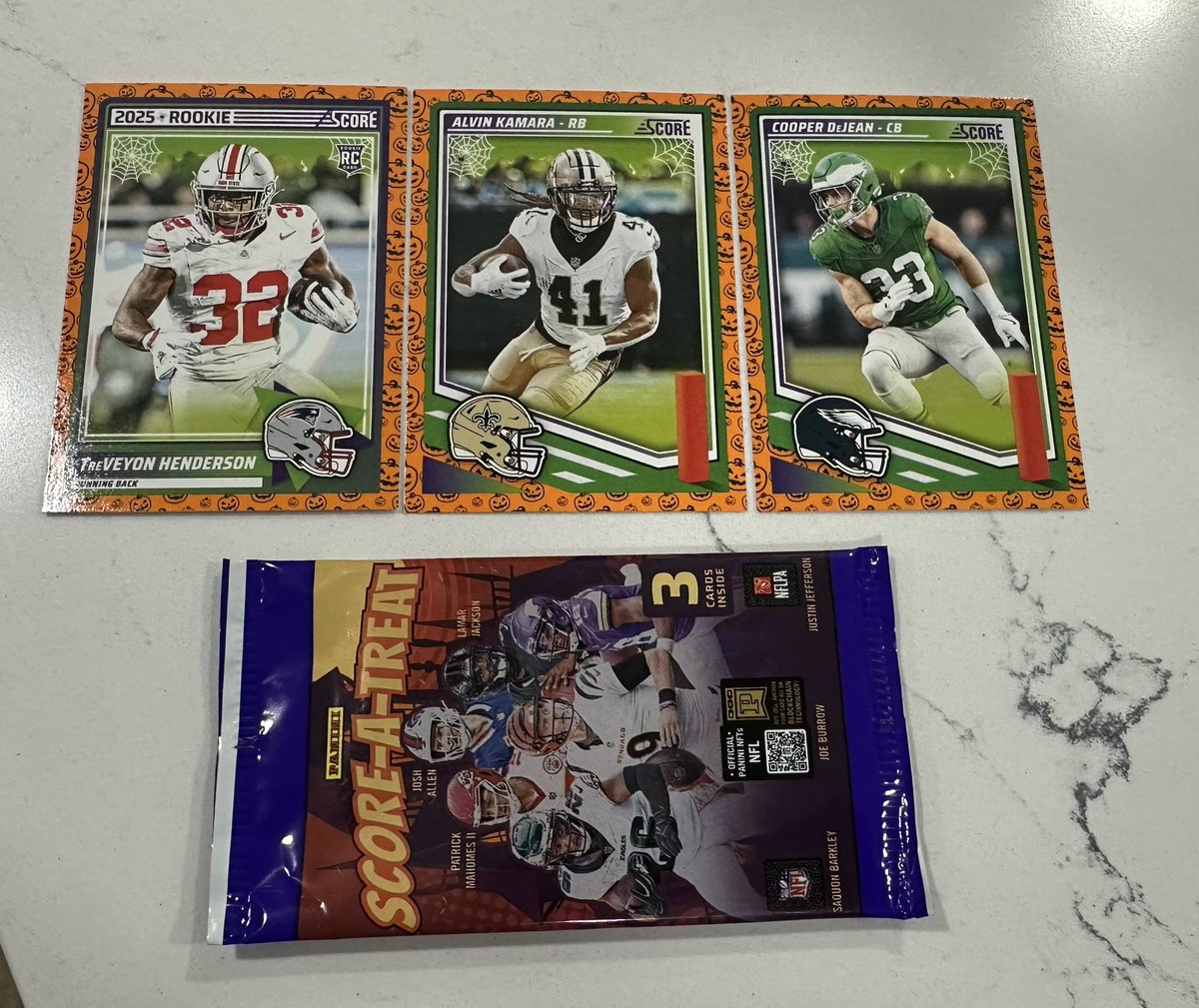 TheGentleman151's tweet photo. I know they are gimmicky, but I think I did pretty well with my @PaniniAmerica Score-A-Treat pack! 

@TreVeyonH4 
@A_kamara6 
@cooperdejean (Go Birds 🦅)

🎩 https://t.co/kWjOwEF88x