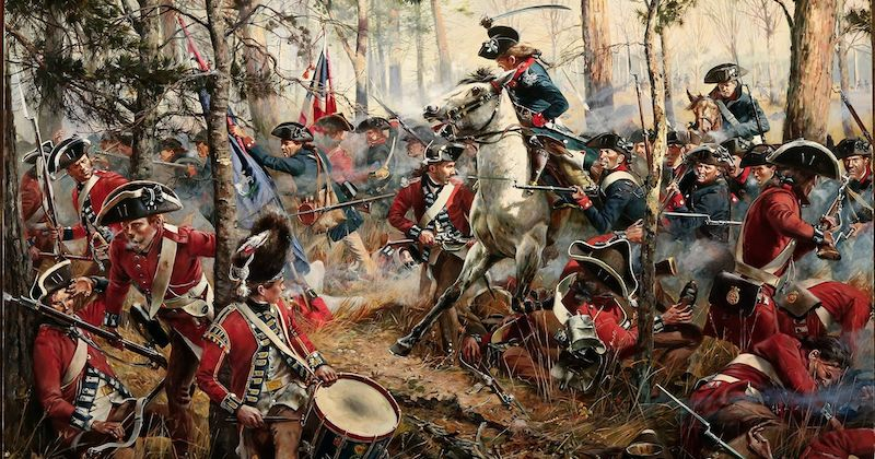 EchoesofWarYT's tweet photo. On this day in 1780, an American army came apart so completely, so fast, that its commanding general ended the day roughly 60 miles from the battlefield, having fled faster and farther than any soldier he was supposed to be leading. It was the most humiliating battlefield disaster of the entire Revolution. It destroyed one reputation forever and, in the same few hours, sealed the legend of one of the bravest men ever to fight for America.

Start with the general, because Camden is partly a story about arrogance. Horatio Gates was the celebrated "Hero of Saratoga," the man given credit for the greatest American victory of the war so far. He arrived in the South glowing with that reputation and immediately began spending it recklessly. He drove his men on a brutal forced march through the Carolina summer with almost no proper food. The night before the battle, his hungry troops filled their bellies with green corn and molasses, and by dawn much of the army was doubled over, sick and cramping with dysentery. He also believed he had far more men than he actually did, and better ones.

The two armies blundered into each other in the dark, sometime around two in the morning, when advance parties collided on the road north of Camden. Both sides pulled back and waited for daylight to settle it. And in the gray early light, Gates made the single decision that doomed everything. He placed his greenest, shakiest troops, untested Virginia and North Carolina militia who had never seen a real battle, on his left, directly facing the most hardened, professional British regulars on the field. He put his weakest men against the enemy's strongest.

What happened next barely qualifies as a fight on that side. The British stepped off and came on with a bayonet charge, a wall of disciplined regulars advancing at a trot, cheering, steel leveled and flashing. The militia looked at that and their nerve simply shattered. Most of them never fired a single shot. They flung down their loaded muskets and ran, more than a thousand men dissolving into blind panic in a matter of moments, sweeping backward and tangling with the men behind them. Half the American army was gone before it had truly engaged. Gates himself was caught in that human flood and carried off the field in the rout, and he did not stop. He rode all the way to Hillsborough, roughly 180 miles in three and a half days, an escape so fast it became a national joke and a permanent stain on his name.

But turn to the other end of that field, because that is where the heroism lives. On the American right stood the Continentals, the real soldiers, tough, drilled, veteran, and they were commanded by Baron Johann de Kalb. And here is a detail most people never learn: de Kalb was not actually a baron at all. He was born a Bavarian peasant, the son of farmers, who had invented a noble-sounding name years earlier because a commoner could never rise as an officer in the armies of Europe. He had clawed his way up by sheer ability, crossed the Atlantic, and thrown his life in with a revolution of ordinary men trying to build a country where birth would not be destiny. Nobody had more reason to believe in the cause than the fake baron who embodied it.

When the militia vanished and the entire left of the army evaporated, de Kalb either did not know or did not care that the battle was already lost. He led his outnumbered Continentals forward, straight into the British, in a counterattack so fierce that for a time these abandoned, surrounded men were actually driving the enemy back. The British had to pour in everything, including their cavalry, to deal with them. In the thick of it de Kalb's horse was shot dead beneath him and he crashed to the ground. Before he could rise, the redcoats were on him. He was shot three times and bayoneted again and again, eleven wounds in all, and still he kept trying to fight and rally his men until his body finally failed him.

Even his enemies were staggered by it. British soldiers carried the broken old general off the field with something like reverence, and Lord Cornwallis sent his own personal physician to try to save him. It was hopeless. Eleven wounds are too many. De Kalb lingered a couple of days and then died. British officers, the very men whose army he had just tried to shatter with a handful of troops, attended his funeral out of respect. He was buried at Camden, and he lies there still, the peasant who called himself a baron and died like the noblest man on the field.

That contrast is the entire meaning of Camden. On one side, a celebrated general who lost his head and outran his own men to safety. On the other, a foreign-born commoner who chose to die on his feet in a battle everyone else had already fled. The defeat itself was catastrophic. The American army in the South was gutted, thousands killed, wounded, or captured, and the British looked, for a moment, like they had won the entire region. Gates was disgraced and stripped of command, replaced by Nathanael Greene, who would patiently, brilliantly turn the whole southern war around over the next year and set the road to Yorktown.

But the image that outlived the disaster was not the running general. It was the dying baron, propping himself up amid the wreck of his command, refusing to yield. Camden proved something the Revolution kept proving in its darkest hours: that a cause can survive a lost battle, and that how a man stands when everything is collapsing around him can matter far more than whether he won that day.