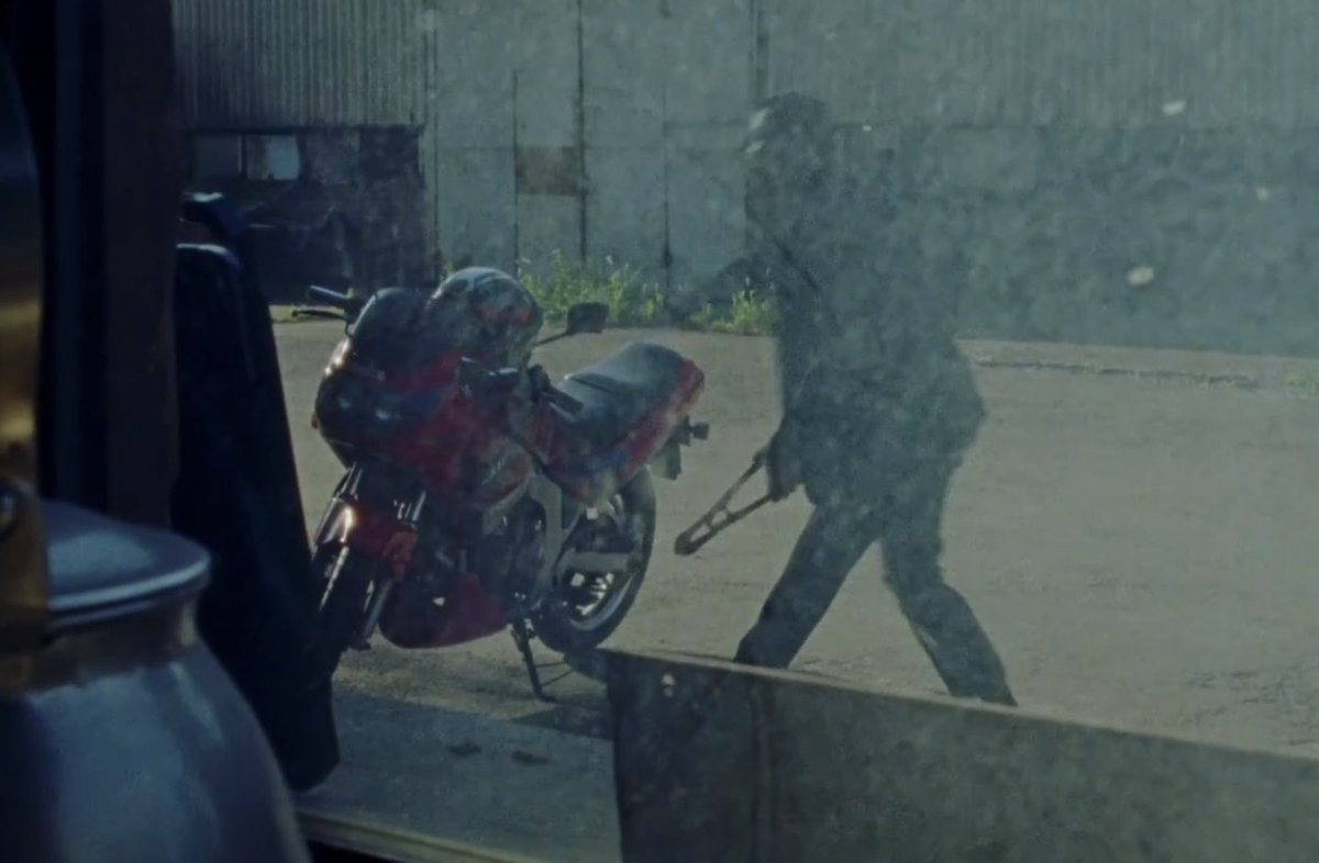 jellyyjn's tweet photo. from being gifted the motorcycle, the mob tampering with his brakes, him realizing that something was very wrong, to the ending shot this is the most devastating photo sequence ever https://t.co/dRdqdVNZcZ