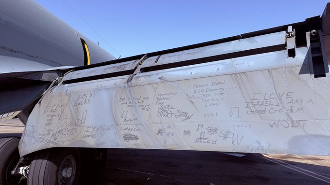 ImBreckWorsham's tweet photo. US servicemen in the Persian Gulf are scribbling messages in the dust of an aircraft wing, per an image from the field sent to Trita Parsi.  

The messages include:
  
-"Be a good goy and do what Israel tells you to"   
-"Operation Epstein Fury"   
-"Peace deal #64 incoming... ALL THIS FOR THE HOLY LAND"  
-"LOVE ISRAEL I AM A GOOD GOYIM"  
 -"BiBi's bucks"   
-"IY Flock Cameras"

A US serviceman adds "what people in the media don't understand when they compare past conflicts to this one, is this operation has no morale behind it. That makes a world of difference to service members deployed to undesirable locations indefinitely."

-@HormuzLetter