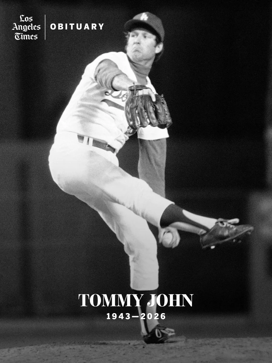 Black and white photo of Tommy John pitching in a Dodgers uniform. Text reads Los Angeles Times Obituary Tommy John 1943-2026