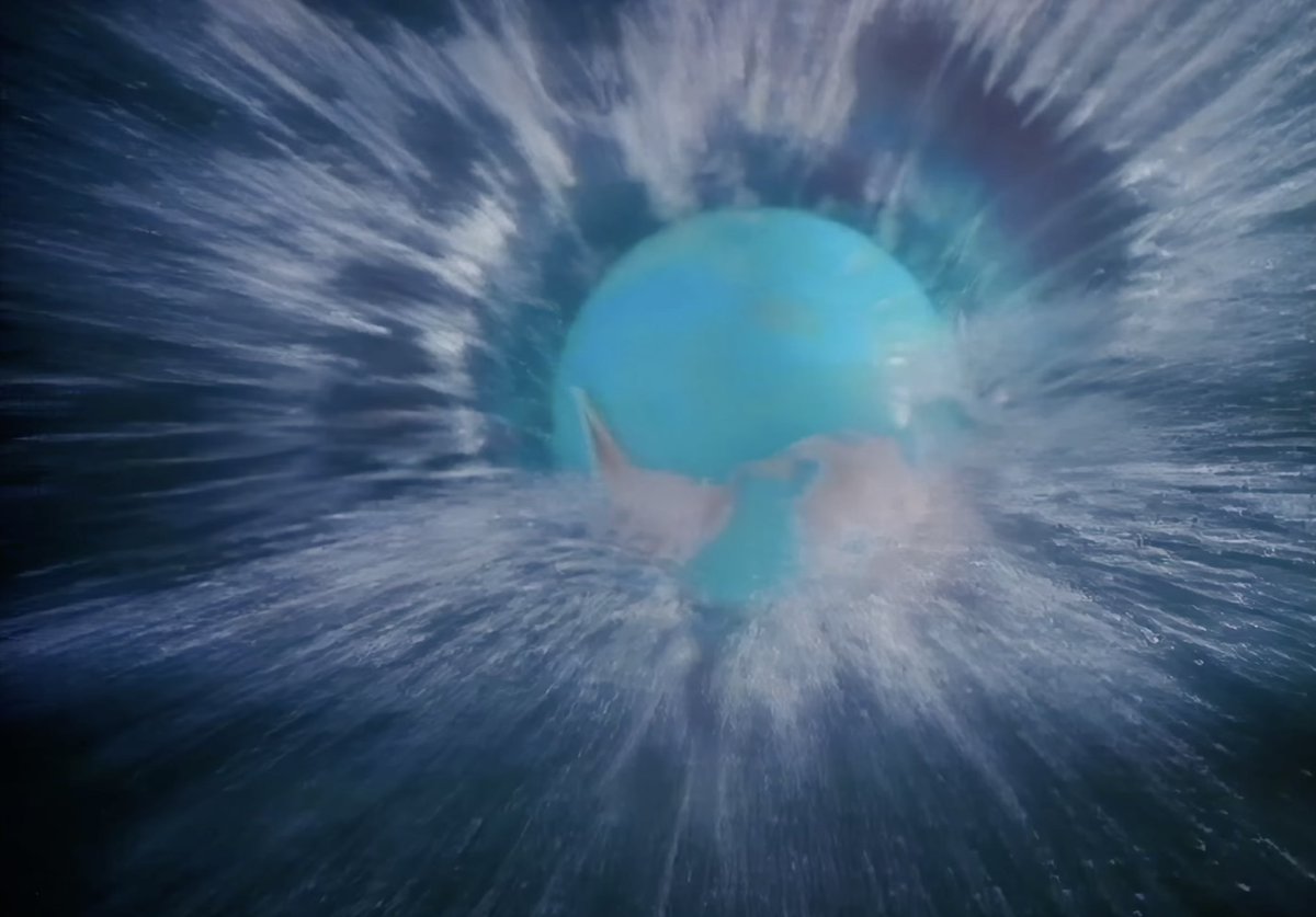 A2Q93's tweet photo. Belinda Carlisle – Heaven Is a Place on Earth (1987)

1s: Globe (State 2 orientation?) dropped in water...
36s: Pyramid of Earths (with different poles?)...
2:21-2:22: Earth (ECDO State 1-2?) transitions...
https://t.co/Ory3qP87kD
#ECDO https://t.co/mC28ZT4FAR