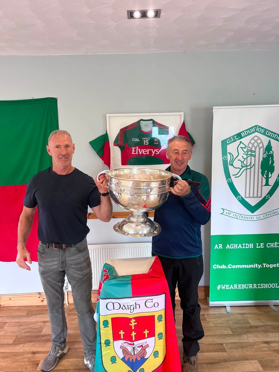 edmcgreal's tweet photo. More pics to make the heart soar ... Colm Mac and John Pat Sheridan with Sam @BurrishooleGAA today. John Pat is a great Gael and sure Colm Mac, not only is he a Mayo legend, but he has given back so much at club level. Two men who earned this moment https://t.co/Gi25kmSoLv