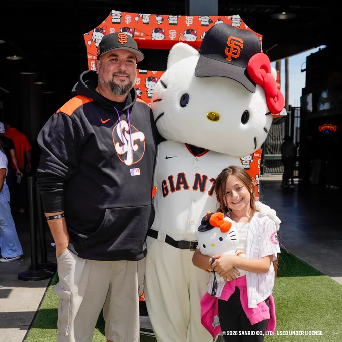 Hello Kitty poses with fans