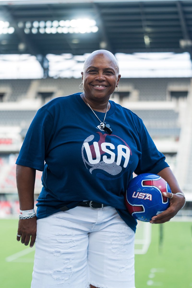 DCPowerFC's tweet photo. An absolute LEGEND ⚡️💙 Thank you to former @USWNT player and first African-American woman to play for the team, Kim Crabbe, for helping us kick off our season at Audi Field #PowerUpDC https://t.co/ugpXQguxfK