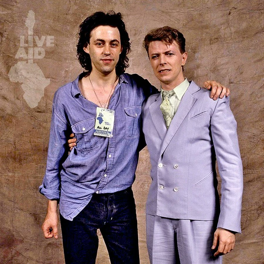 Laura318tt's tweet photo. Bob Geldof and David Bowie at Live Aid 1985. What a legendary day! https://t.co/RYMnWwfWEq