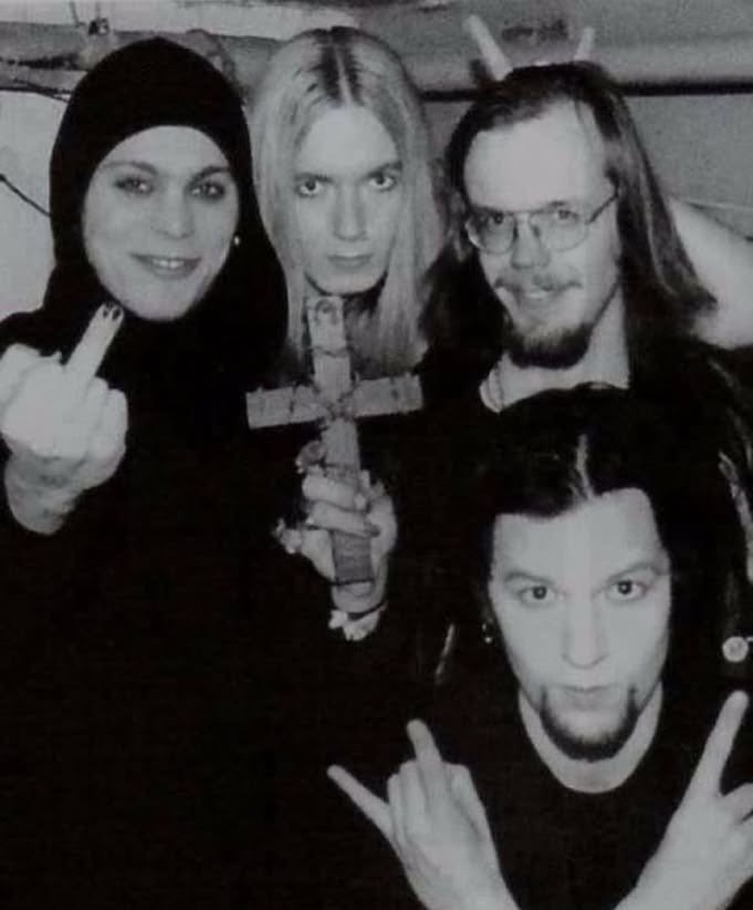 unidunn's tweet photo. Lovely photo of him (band) and one off putting woman in a hijab https://t.co/aag64ewSkP