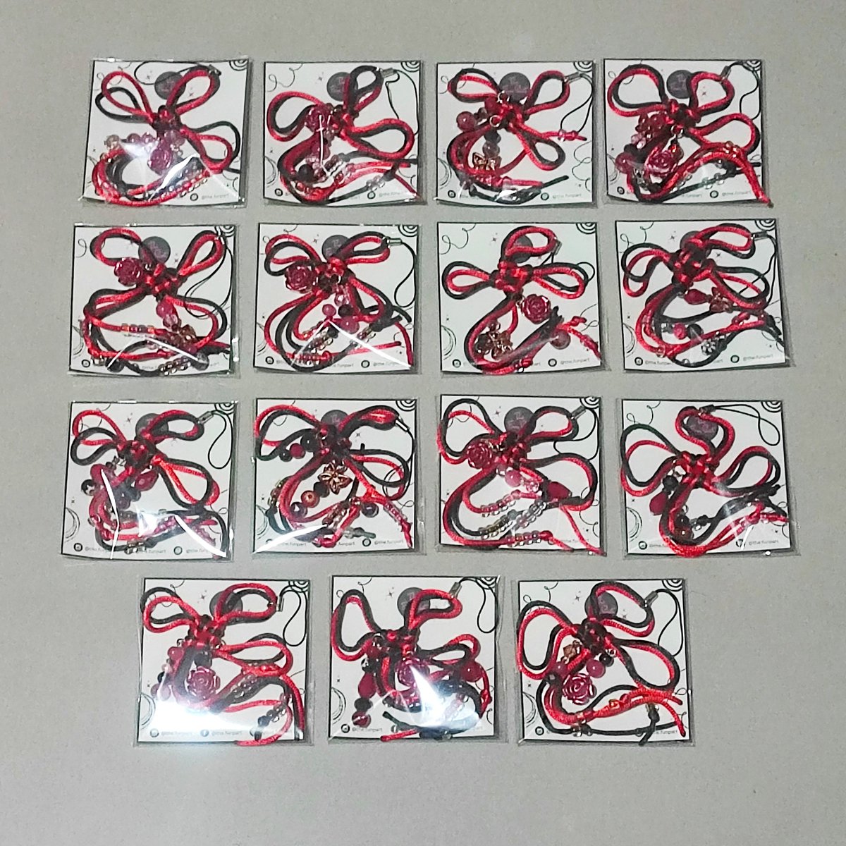 TheFunPart_'s tweet photo. Months of hiatus &amp; we’re baaack!!!
Made these lucky knot charms as concert freebies for The Rose (Korean Band)  ROSETOPIA show last Sat!
Red &amp; black,handmade, &amp; no two designs alike.  Lucky knots = good fortune, protection &amp; blessings—so basically, a cute little good-luck charms! https://t.co/FE3b9jBF5G