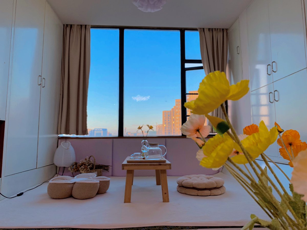 Russell95100715's tweet photo. Just checked into a boutique capsule hotel in downtown Tokyo – tiny space, zero clutter, and that first sip of matcha on the mini balcony Game-changing cozy new vibe I didn’t know I needed! https://t.co/buYrN1AyEz