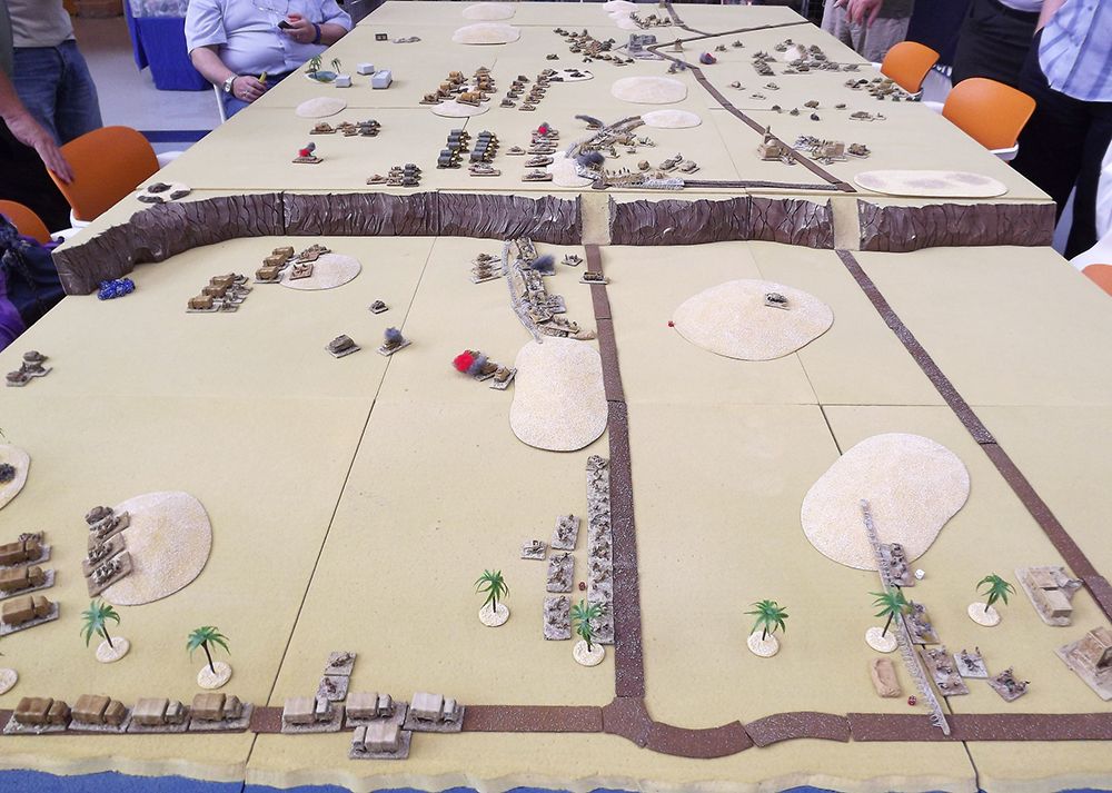 pendraken's tweet photo. This North Africa WWII game is from the old Derby show in 2011 and has a nice cliff feature in the middle, something we don’t see very often on display games.  #mondaymotivation #10mm #pendraken #wwii https://t.co/hMGMsIpLVW