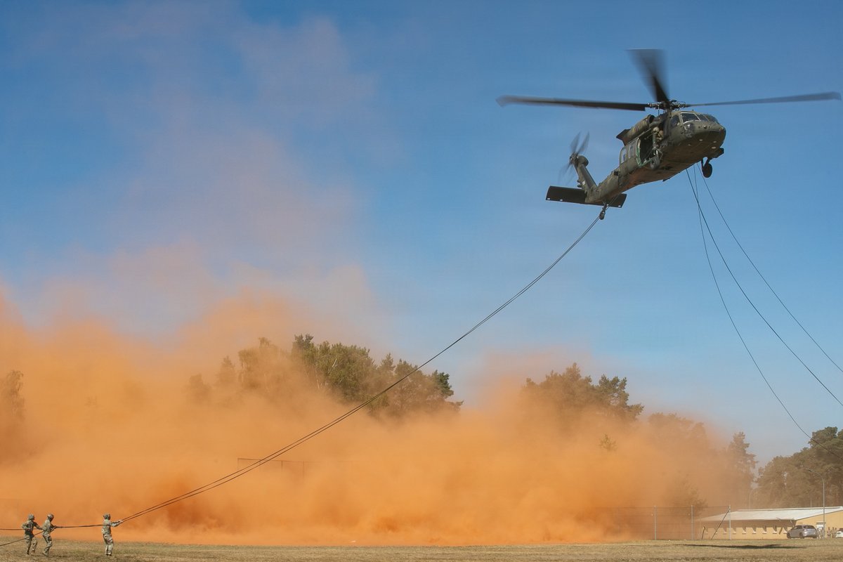 USArmyEURAF's tweet photo. One rope. One step. No hesitation.

Soldiers at Air Assault School conducted rappel operations from a UH-60 Black Hawk at Grafenwoehr, building the skill and confidence to move from aircraft to ground. 

#ThisIsUSAREURAF | #7thATC https://t.co/OfBoYfZmUf