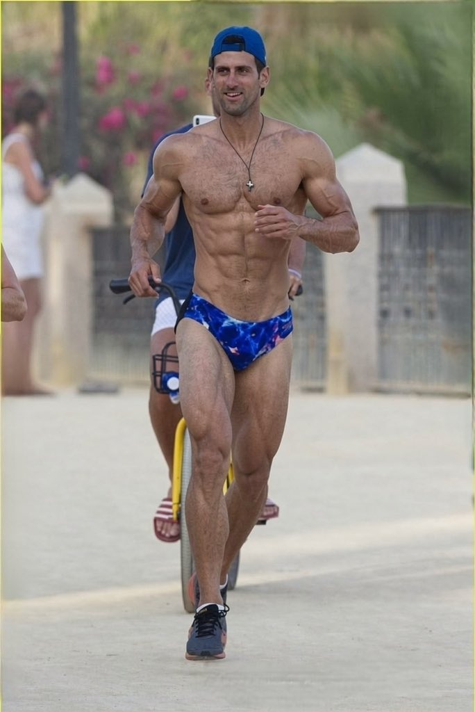 PridePopCulture's tweet photo. Tennis Star Novak Djokovic Runs Shirtless in His Speedo Ahead of US Open! https://t.co/1nors1BhnK