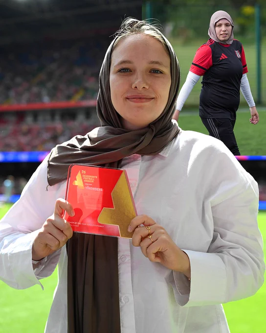 Sara Fahad, winner of Coach of the Year (Female), holding her Grassroots Football Award at Principality Stadium.