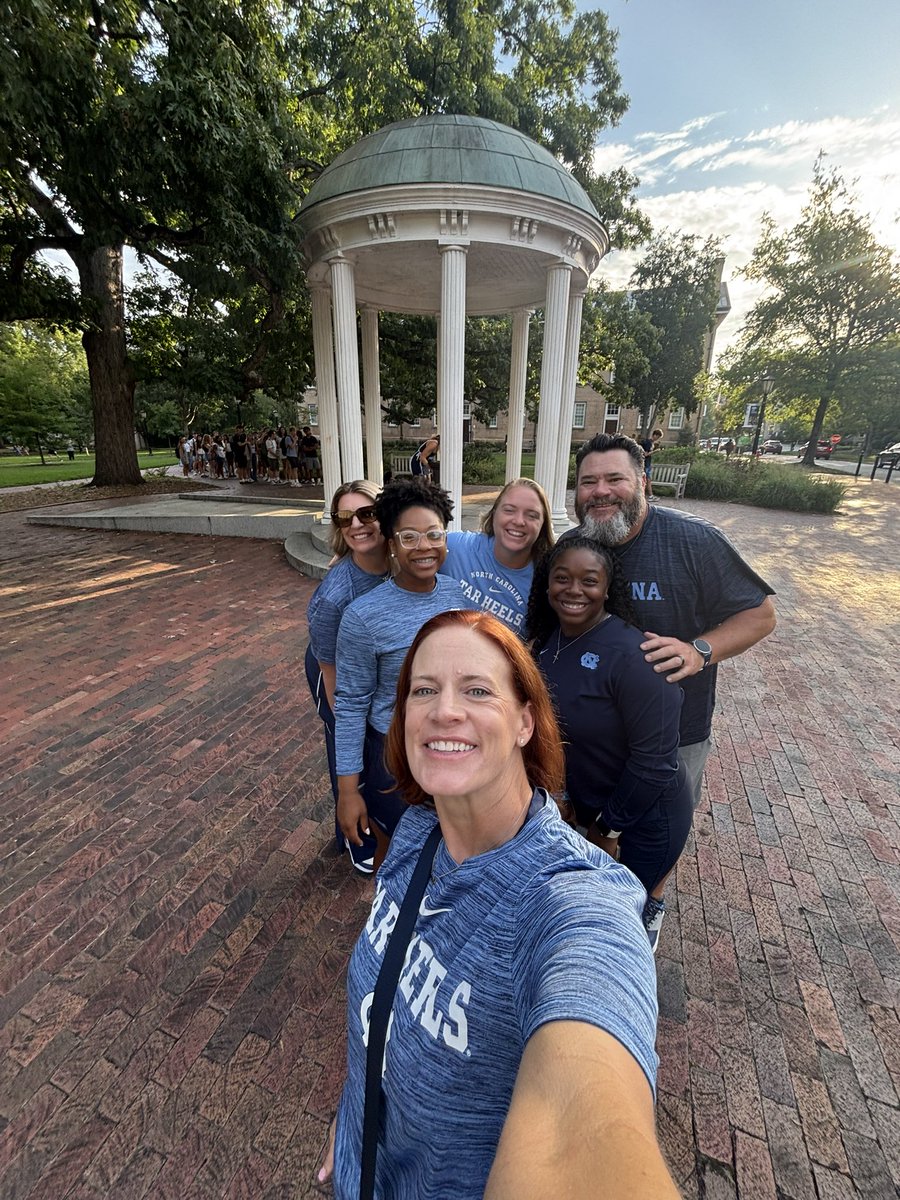 coachmegsmith's tweet photo. First day of classes, Carolina style. A sip from the Old Well and we’re ready for all that’s ahead. Excited for another year in the Southern part of Heaven with these amazing people! 🩵🐏 https://t.co/uoEZgdOFbn
