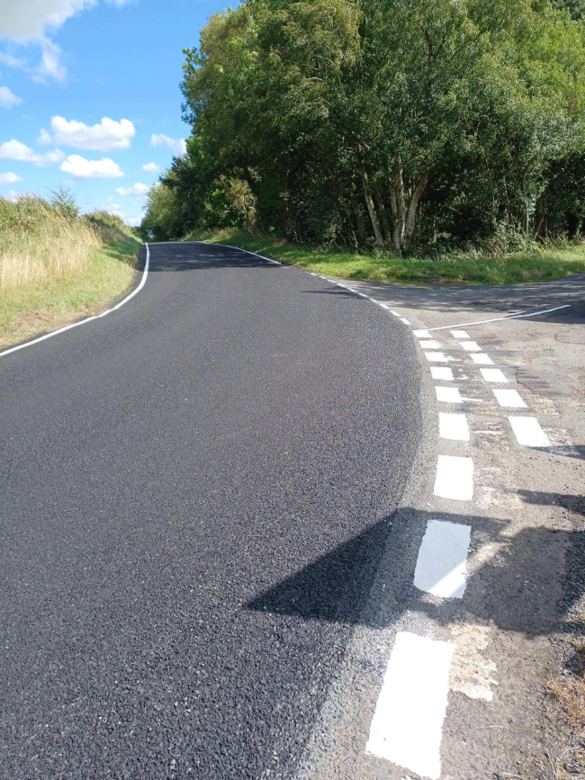 N_landCouncil's tweet photo. One of the many sections completed in our summer surface dressing programme is the road between The Sill + the A69 west of Hexham - a key road for visitors and locals. It's all part of our 3-year £100m Local Transport Plan ensuring improvements throughout Northumberland. 🛣️ https://t.co/DTLi5yqKOO