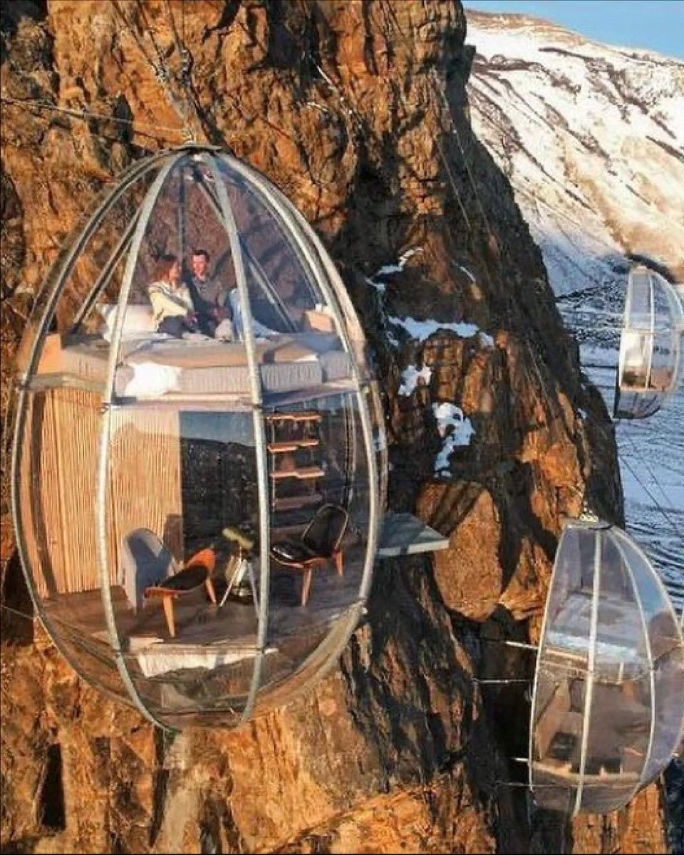 hutdesigns's tweet photo. Imagine waking up inside an egg-shaped glass capsule suspended 900 feet off a mountain face at OVO Patagonia https://t.co/QT35C1QnCe