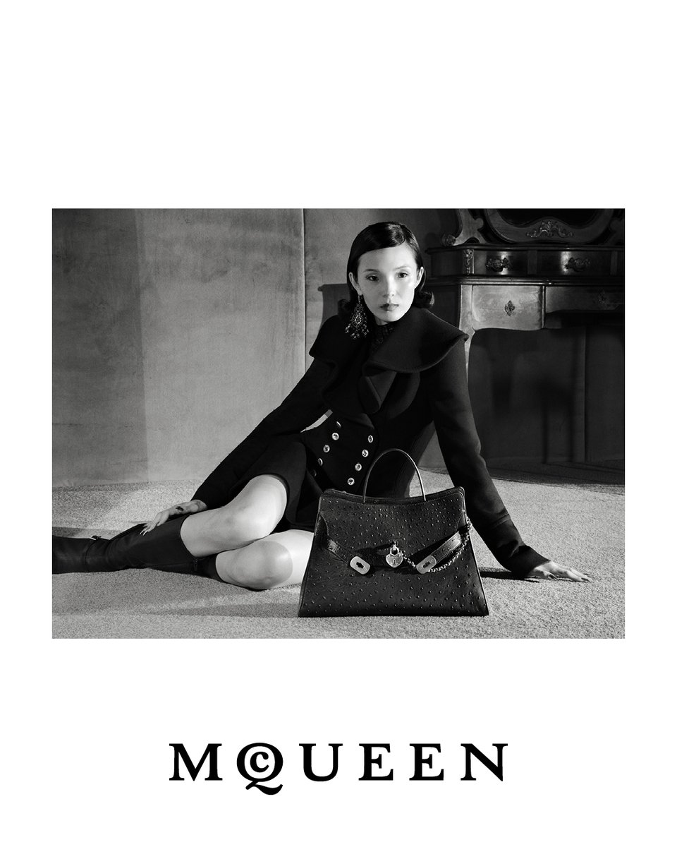 McQueen's tweet photo. McQueen Autumn Winter 2026 campaign – a synthesis of character and modernity.

Tailoring precision met with sculptural elegance and intricate detailing. 

Creative Director: Seán McGirr
Photographer & Director: Glen Luchford
Art Director: SJ Todd 
Stylist: Camille Bidault Waddington 
Talent: Xiao Wen
Hair: Anthony Turner 
Makeup: Daniel Sallstrom 
Nails: Ama Quashie 
Casting: Julia Lange 
Set Designer: Gideon Ponte 
Production: Farago Projects 
Music: “Saturday” Performed by Desire, Written by John Padgett, Adam Miller and Nathaniel Miller
