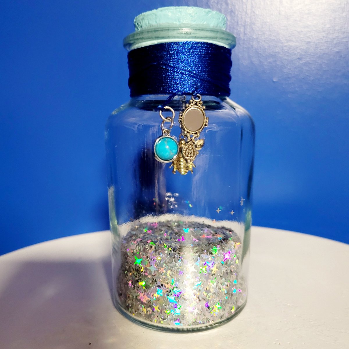 JamesGannonCom's tweet photo. The Bottles of Life 024: Golden Bee- Found within an icy cavern. Normal bees attack you, golden ones attack for you. Includes a magic mirror and a lunar gem to aid in finding yourself and your way home. 🐝🪞🔵🧊 #thebottlesoflife #artsandcrafts #bottle https://t.co/bzmUlMiMbp