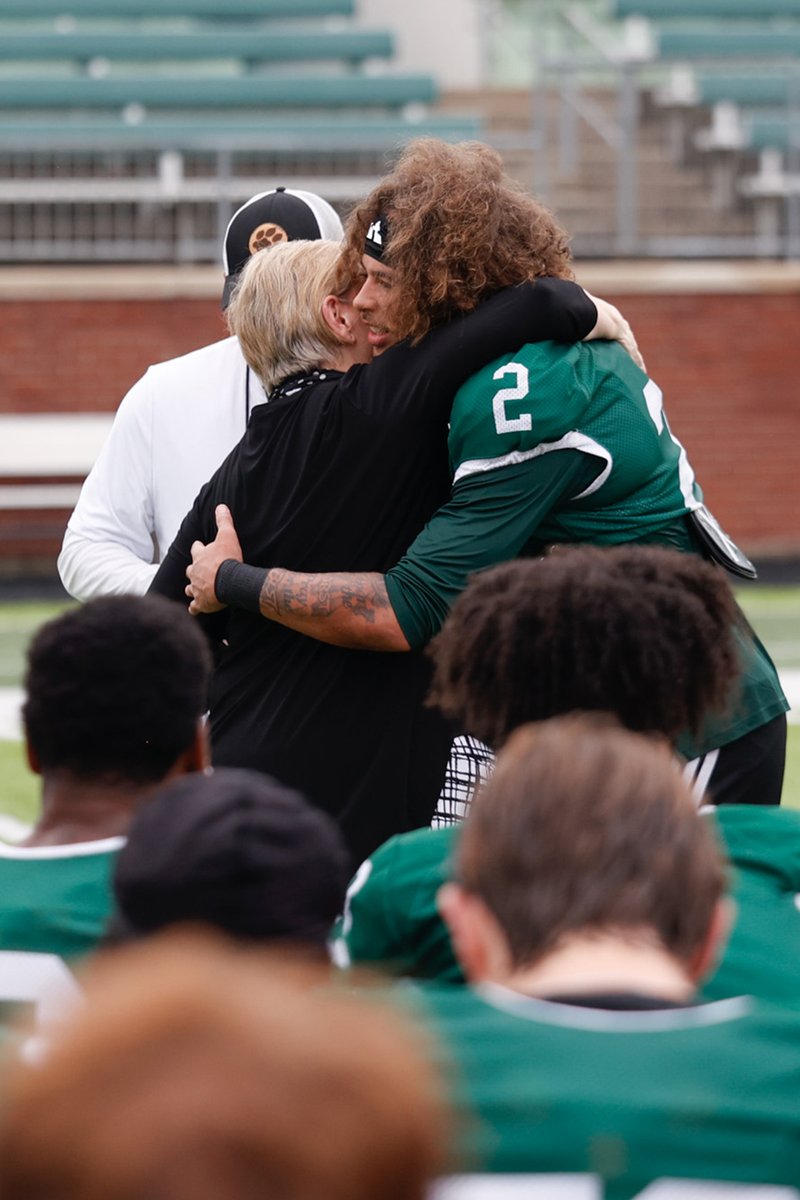 OhioFootball's tweet photo. A special guest made an appearance at practice today 💚 

Thank you, @OHIO_President, for speaking with the team this morning!

#OUohyeah https://t.co/EMZj0tbq2X