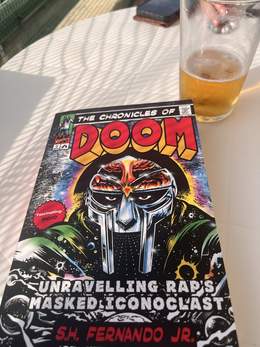 Where_is_Neil's tweet photo. Blasting out 388 by @thecoralband into the Portuguese evening air while leafing through this. Great read so far https://t.co/ZTF776T6bL