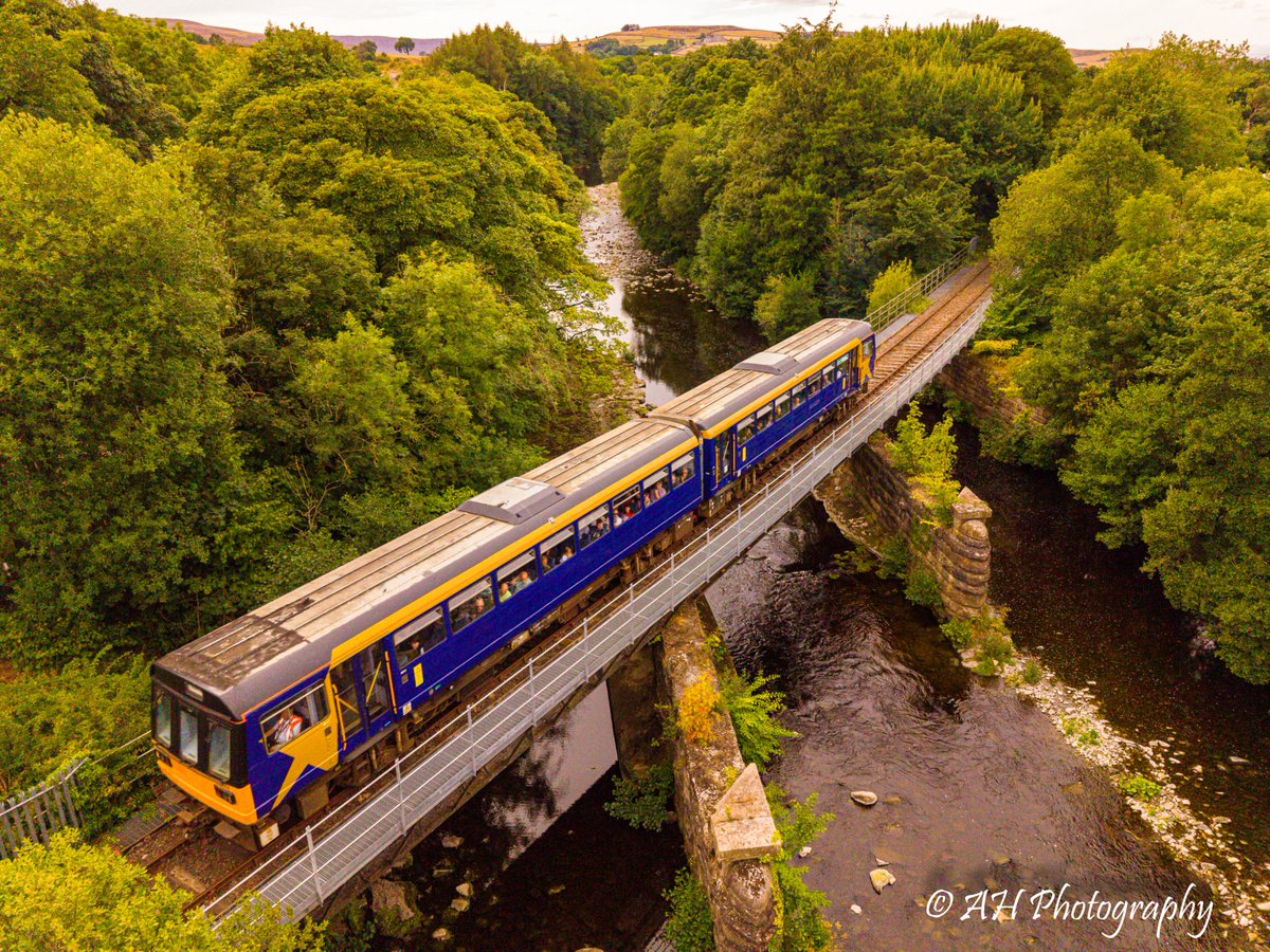 andrew_herny's tweet photo. A Saturday afternoon jaunt up the Wear Valley to clear the mind and visit the @WeardaleRailway to see freshly overhauled Pacer 142094 complete with its' North Western 'Gold Star' livery, pictured crossing the River Wear. #WeardaleRailway #wearvalley #ukrailways #railways #pacer https://t.co/fNYROqU4sF