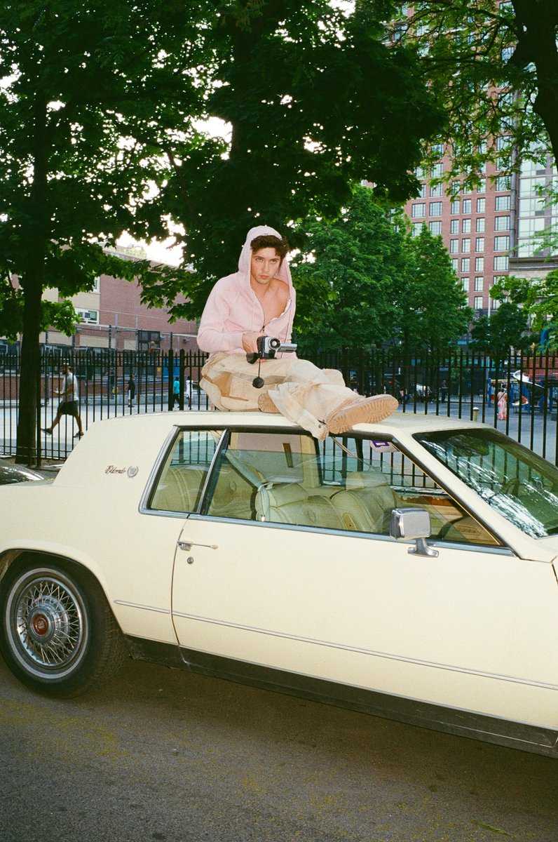 CocoLingoTypo's tweet photo. troye sivan sitting on cars is a rare genre but highly collectible: https://t.co/MOSmFf3uuY