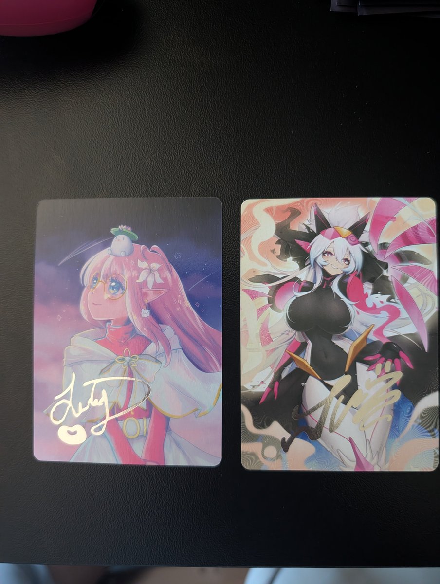 SnoopytheGamer's tweet photo. The 2 artist series cards I got are @CyYuVtuber and @LilyPichu. The cards look great. Nice art from Lily and @WhatJuz Not sure if I should just sleeve them or frame them lol. https://t.co/rQuUZtuWob