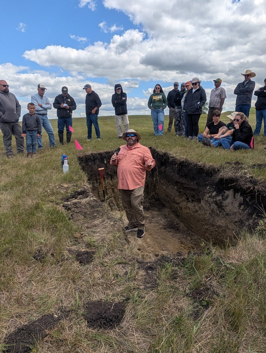 VerdiPlus's tweet photo. It can’t be a great Soil Health Field Day without a soil pit!  How about two?  One was in an undisturbed pasture/hay meadow and the other in a field about 300 feet away.  NECS  Soil Scientist Lance Duey gave us a great rundown of what we were seeing in these locations. https://t.co/Yg9qluuPnz