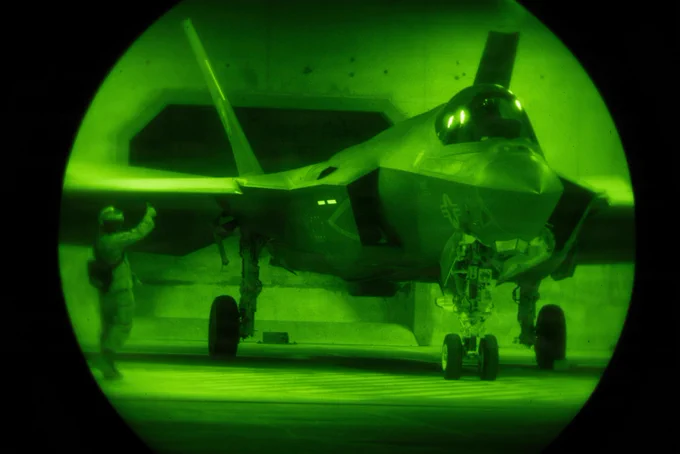 A U.S. Marine with Marine Fighter Attack Squadron 311, Marine Aircraft Group 11, 3rd Marine Aircraft Wing, communicates with the pilot of an F-35C Lightning II in the U.S. Central Command area of responsibility, July 14, 2026. (U.S. Marine Corps photo by Lance Cpl. Samantha Devine)\n\n