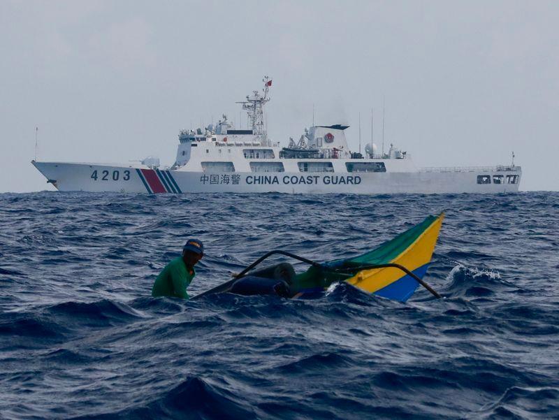 dailymaverick's tweet photo. Two Chinese coast guard personnel marked as “martyrs” after South China Sea collision last year https://t.co/KfZCGgjRAy https://t.co/VA0SVuqFby