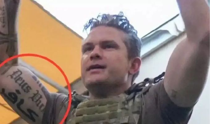 Partisan_12's tweet photo. Did you know that U.S. Secretary of War Pete Hegseth has a tattoo of the Arabic word "Kafir" (كافر), which means "infidel," on his right bicep? 

Interestingly, he also claims to be a Christian. https://t.co/GOObf4beWa